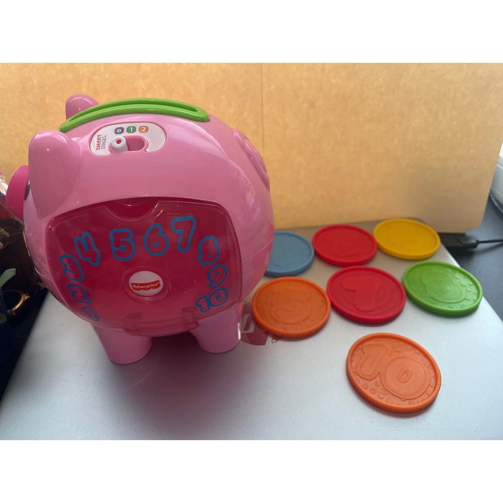 Fisher-Price Laugh & Learn Smart Stages Piggy Bank Pink Musical Toy with 7 Coins